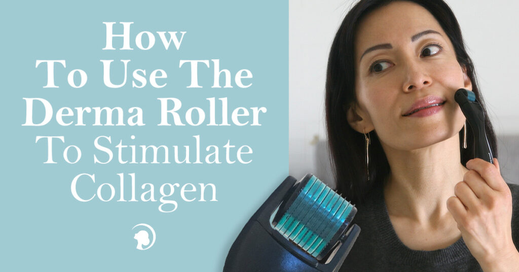 Fumiko Takatsu smiling while holding the face yoga method derma roller on her cheek.