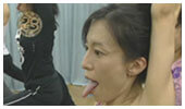 Fumiko Takatsu doing different Big O face yoga exercise.