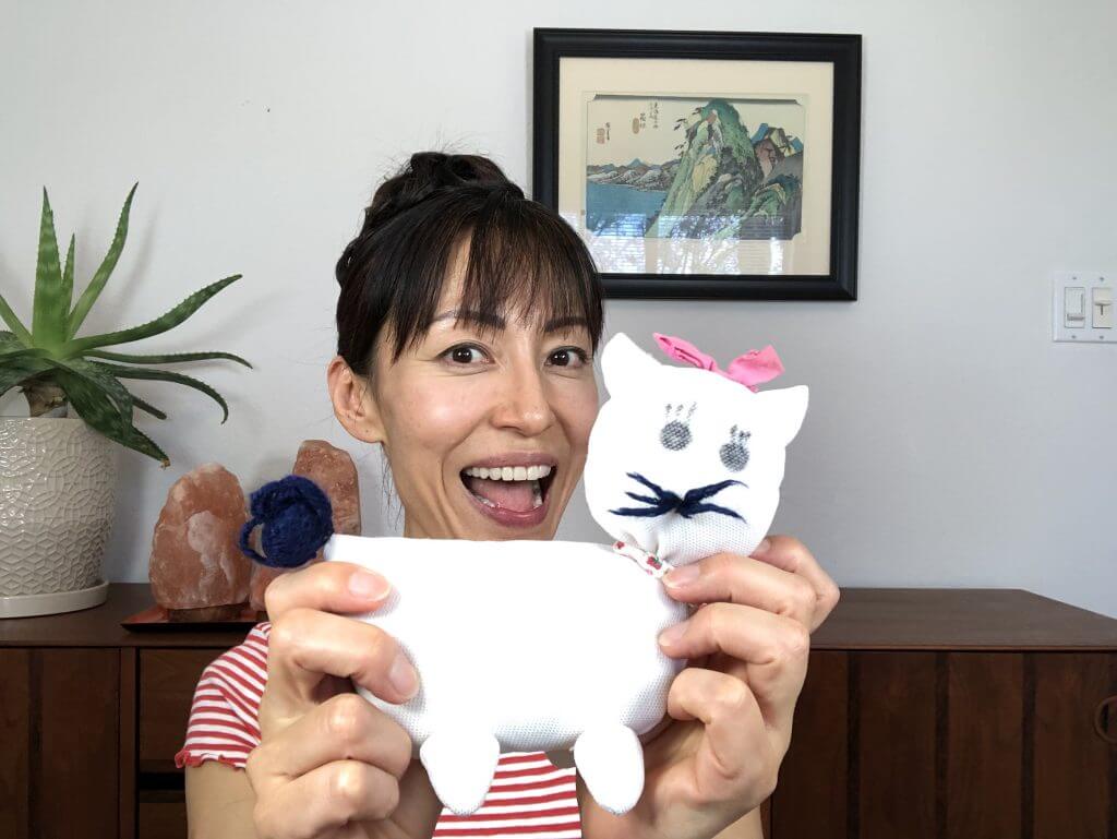 Motherhood and self-care. Fumiko and the stuffed kitten her mom made for her. 
