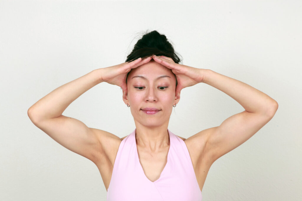 The Forehead Lift (With Body) Pose - Step 2