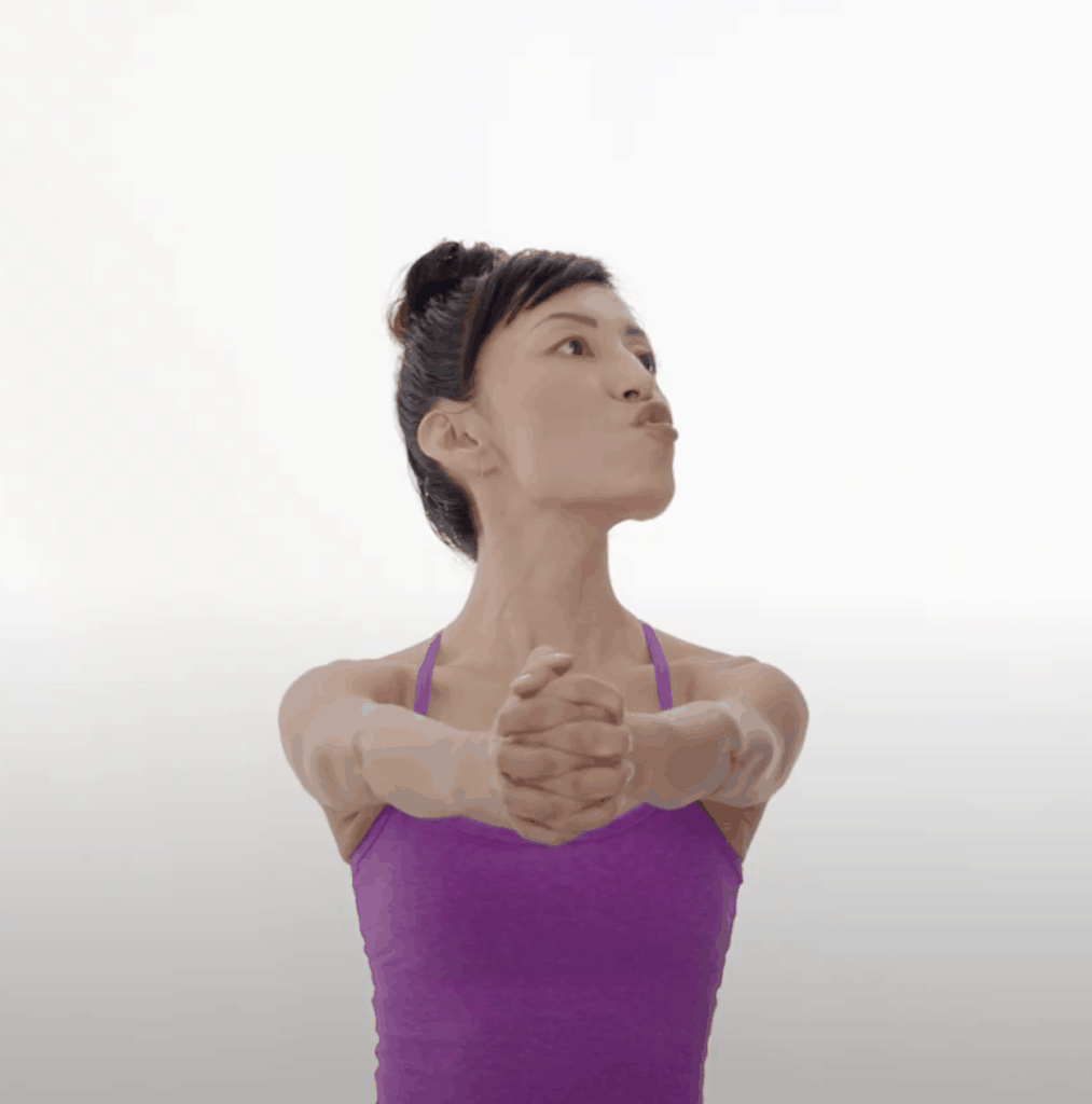 Woman doing Swan Neck - effective neck wrinkle exercise