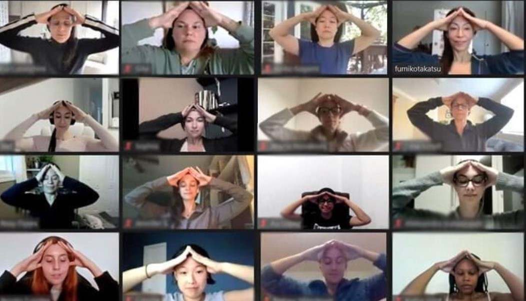 Women practicing face yoga during online live class